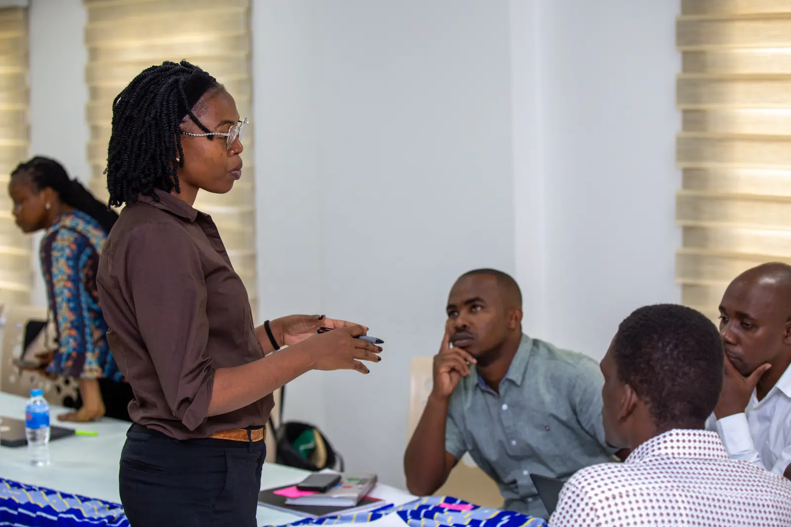 Researchers and institutional partners in a workshop