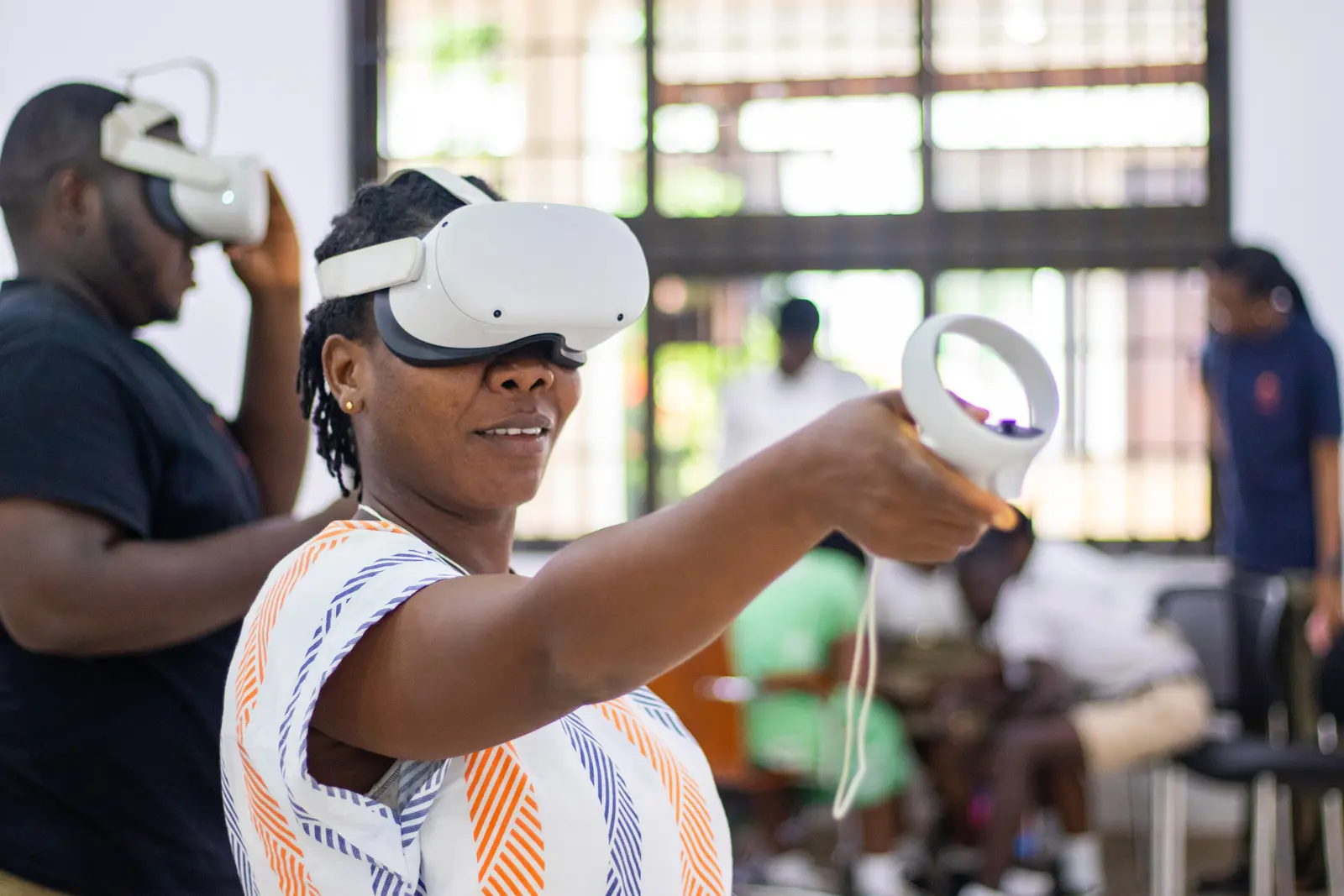 A participant using virtual reality during an immersive learning session